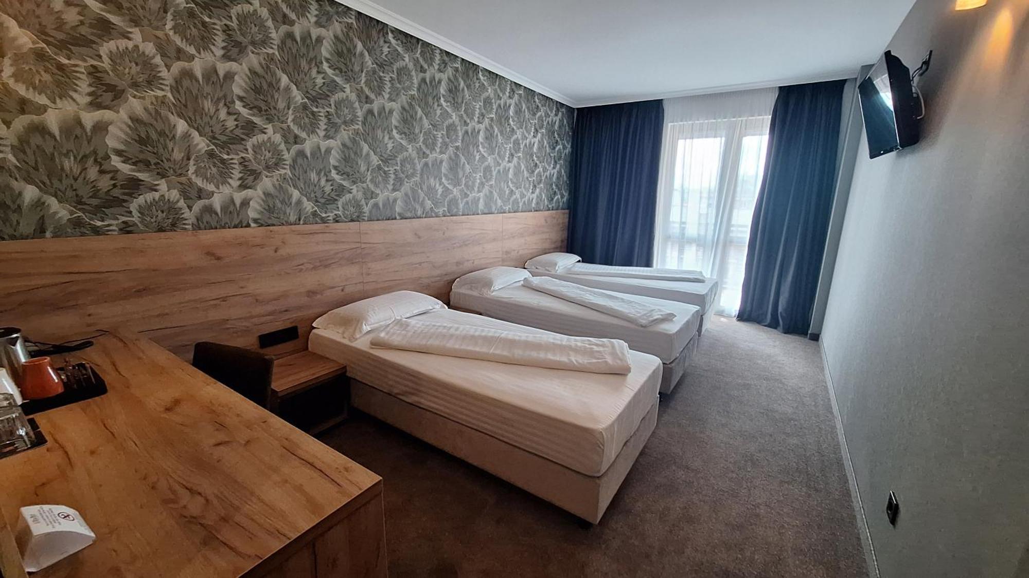 Deluxe Dreibettzimmer