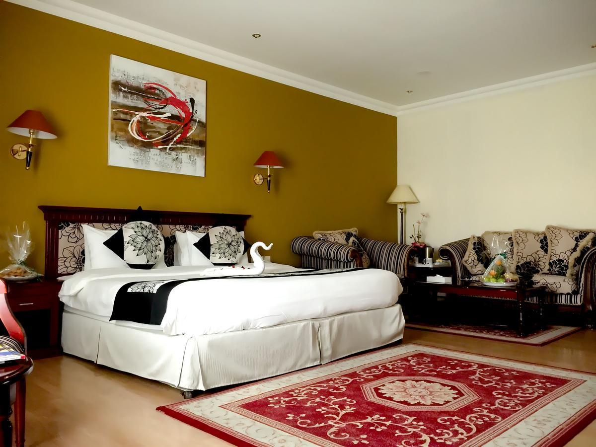Deluxe Zimmer mit Kingsize-Bett